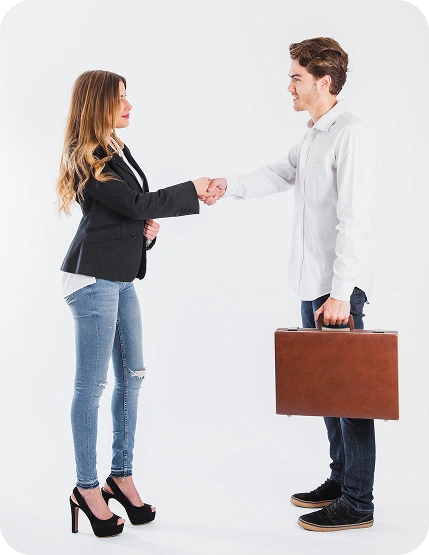Business professionals shaking hands after a meeting